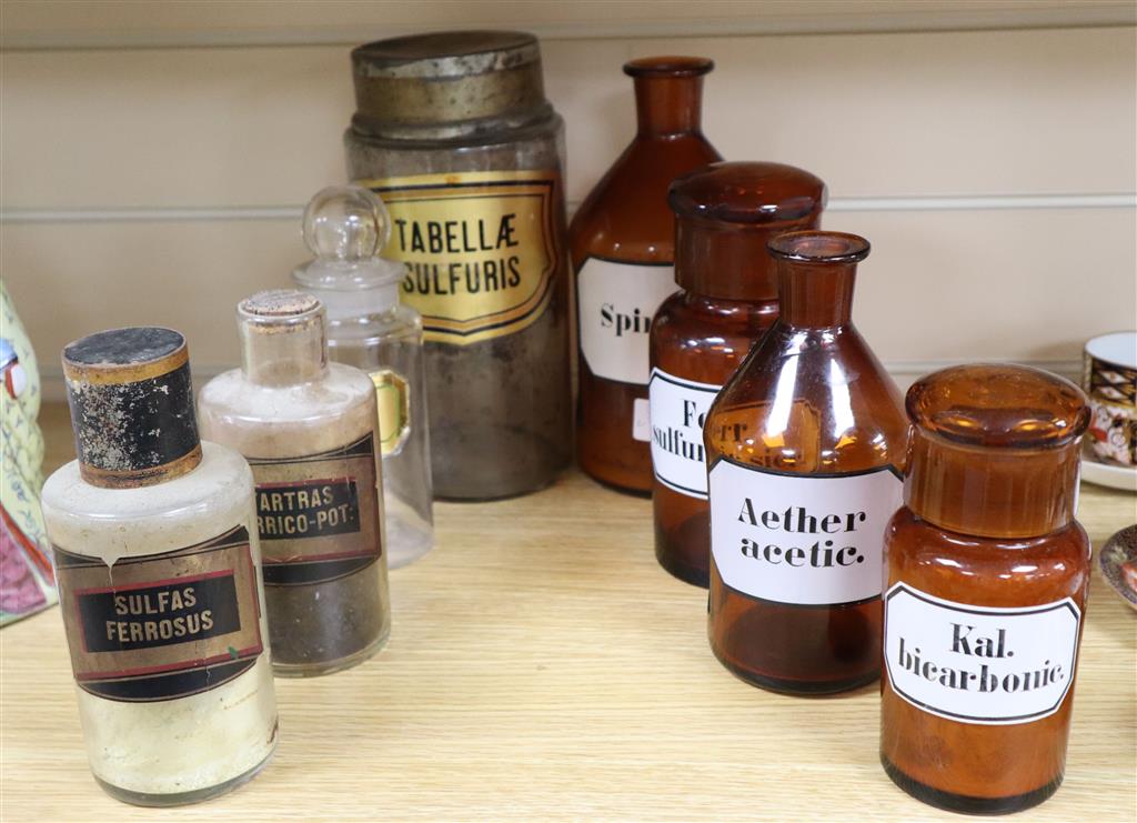 Eight Victorian and later glass chemists jars, each labelled, tallest 25cm